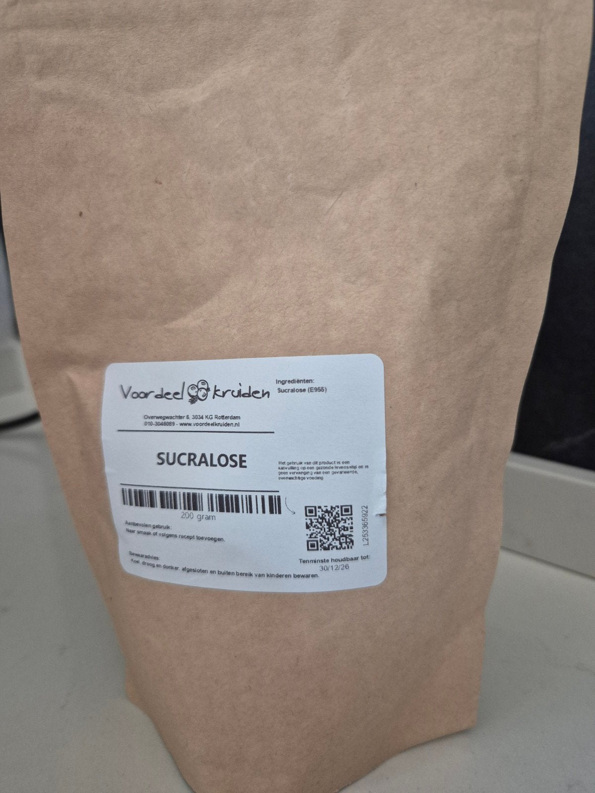 nog volle zak sucralose, Ophalen