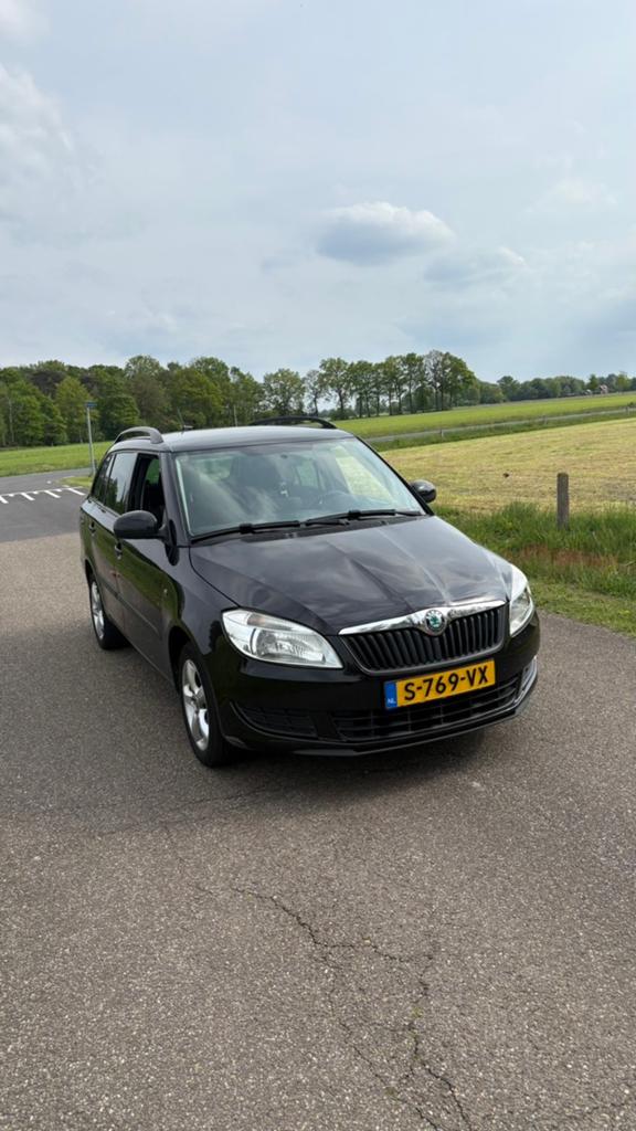 Skoda Fabia 1.2 59pk Combi 2014 Zwart, Auto's, Voorwielaandrijving, 40 €/maand, 1198 cc, Zwart