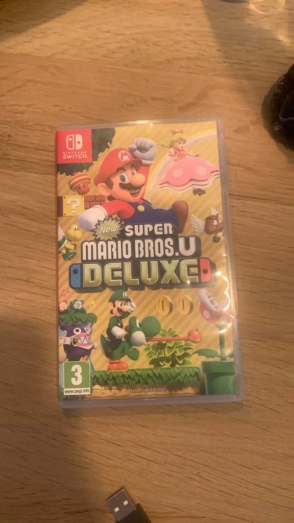 New Super Mario Bros. U Deluxe - Nintendo Switch, Eén computer, Ophalen of Verzenden, Zo goed als nieuw, Platform