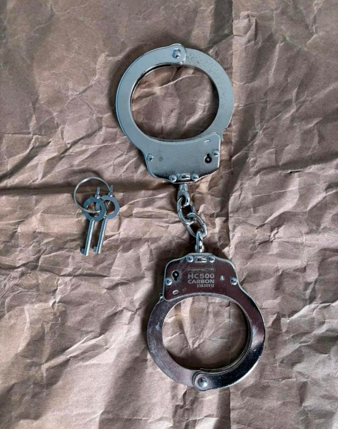 Handboeien | zilver - ketting, Ophalen of Verzenden, Landmacht, Nederland, Overige typen