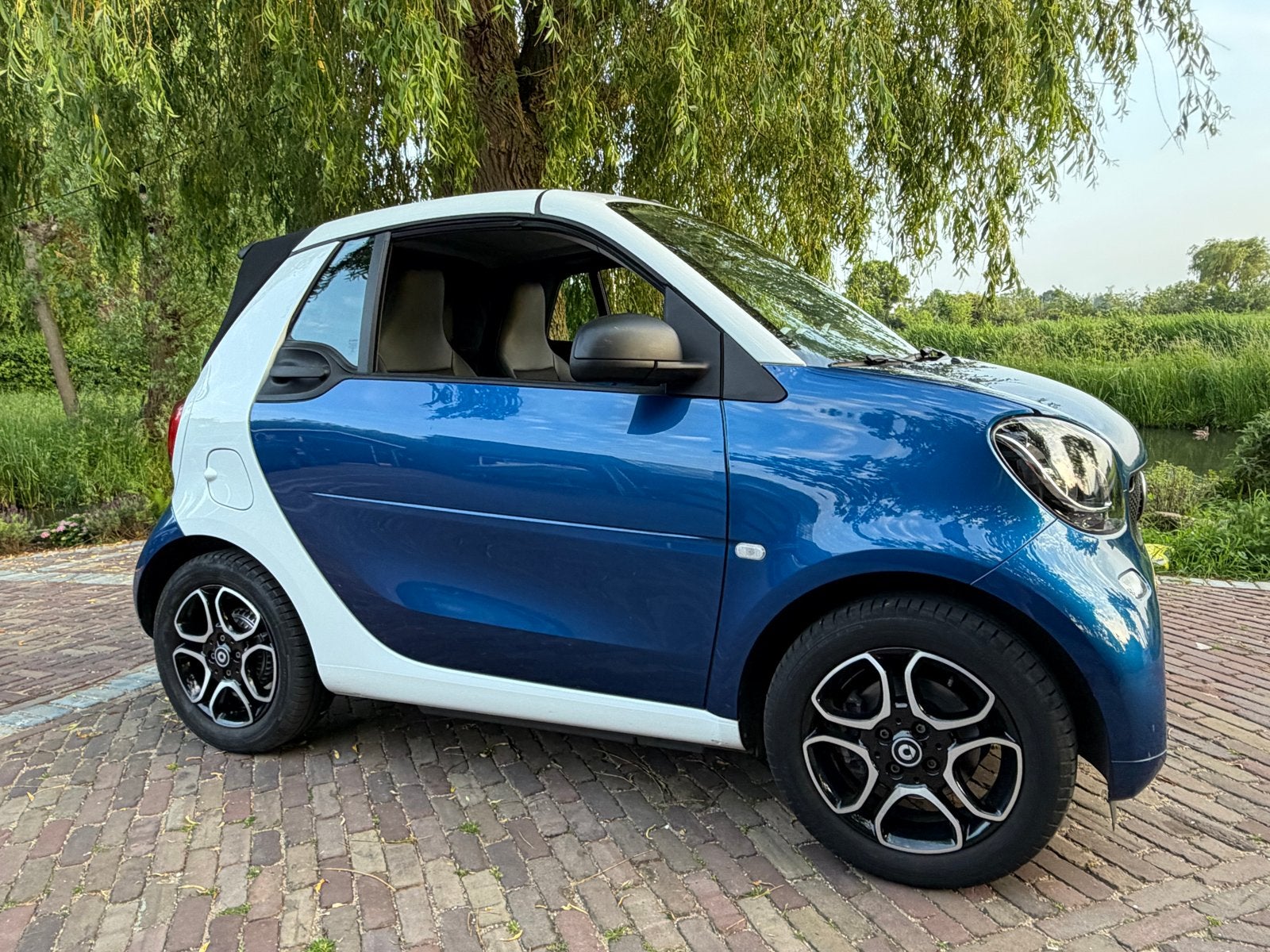 Smart ForTwo 1.0 52KW Cabrio MHD AUT 2016 Blauw, Automaat, Achterwielaandrijving, 31 €/maand, Blauw