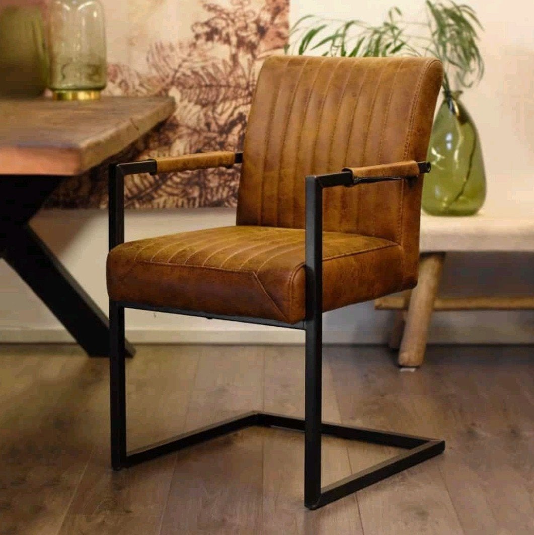 4 Industriële cognac Eetstoelen van HUUS met metalen frame., Ophalen, Bruin, Zo goed als nieuw, Vier