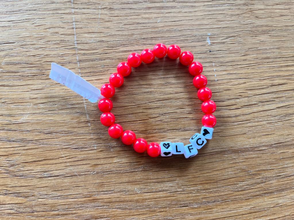 Nieuw Liverpool armbandje, Kunststof of Plastic, Nieuw, Ophalen of Verzenden, Met bedels of kralen