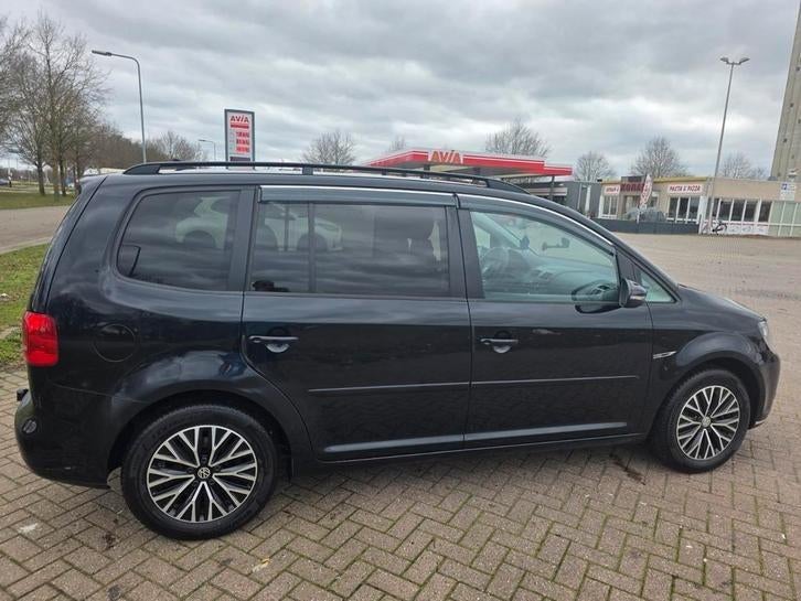 Volkswagen Touran 1.4 TSI 103KW Dsg 7 personen, Auto's, Volkswagen, Stof, USB, 4 cilinders, Zwart