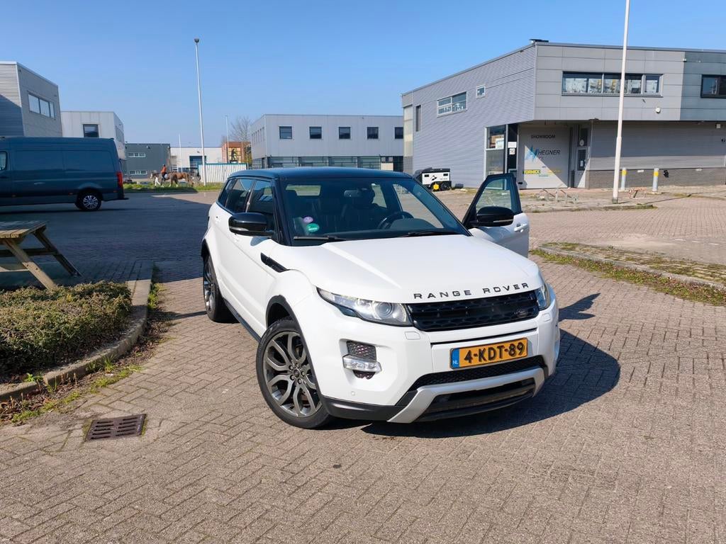 Land Rover Range Rover Evoque SI4 4WD AUT 2013 Wit, Auto's, Automaat, 1800 kg, 4 cilinders, Wit
