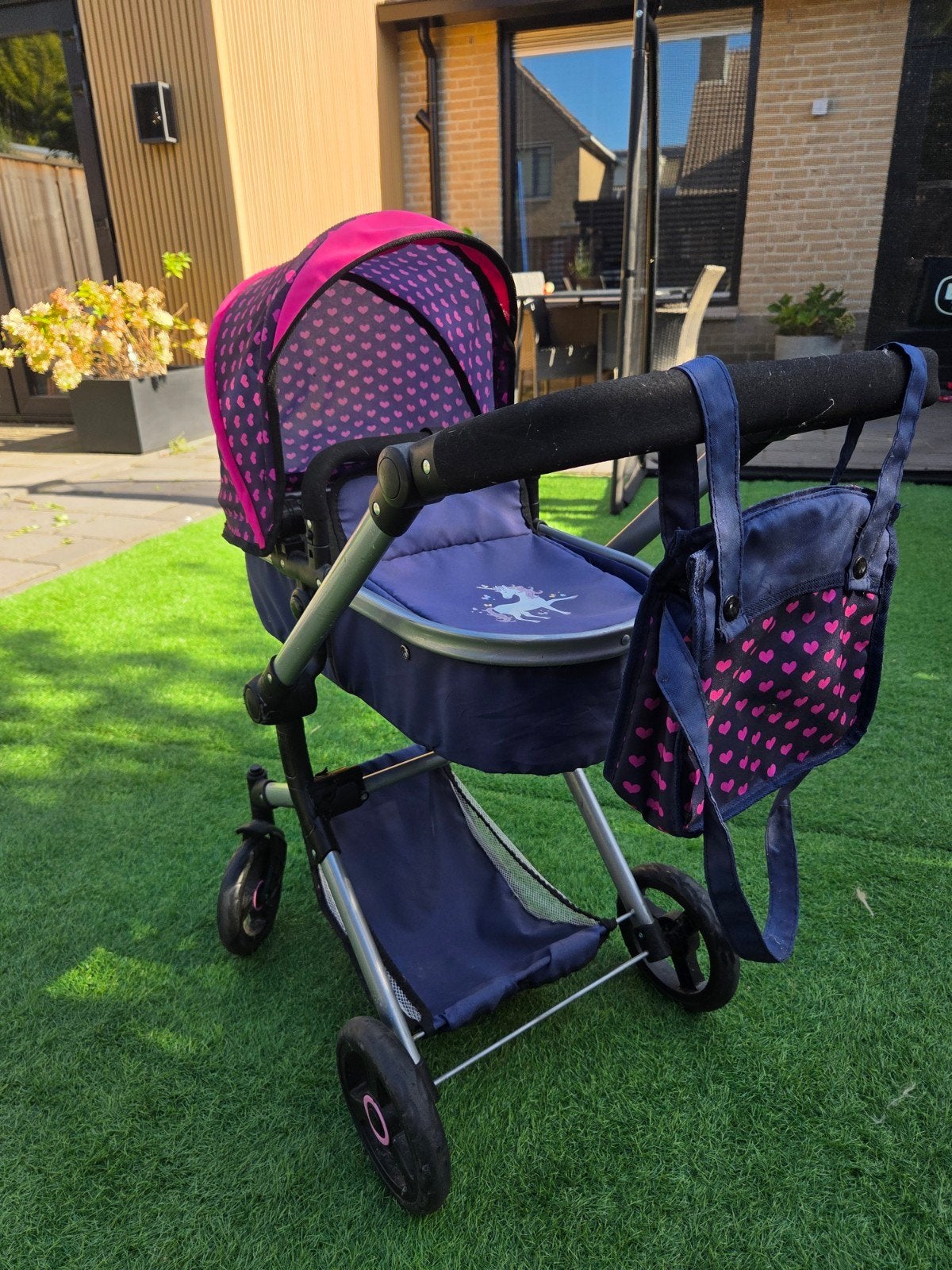 Complete inklapbare poppenwagen met verzorgingstas, Ophalen