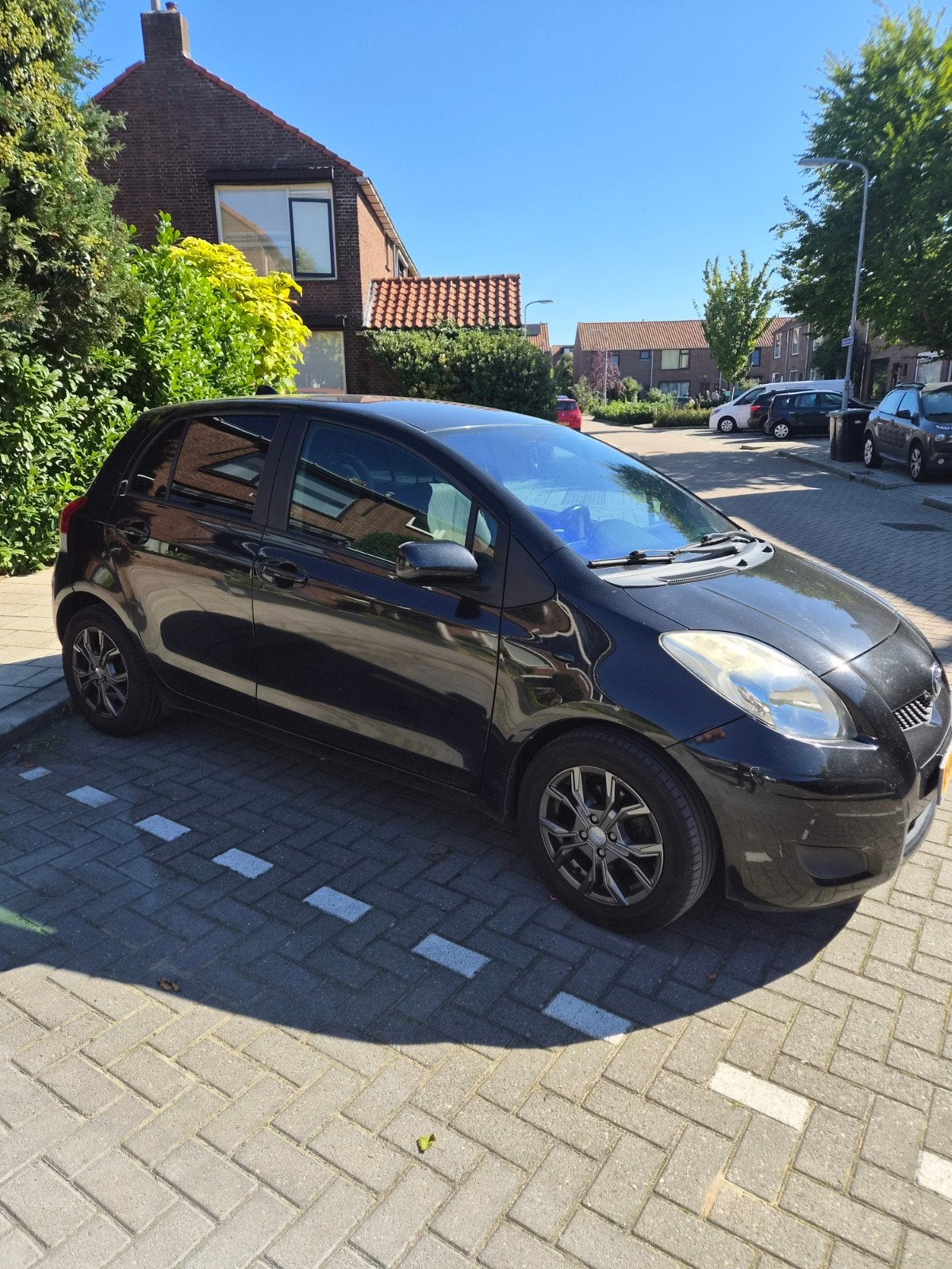 Toyota Yaris 1.3 16V Vvt-i 5DR 2009 Zwart, Auto's, Voorwielaandrijving, 1025 kg, 40 €/maand, 4 cilinders