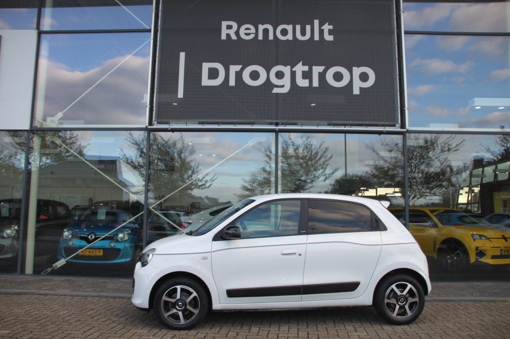 RENAULT Twingo 70PK-LIMITED-AUTOM-74DKM-AIRCO-CRUISE-BLUET-L, Auto's, Automaat, 12 maanden, Gebruikt, 948 kg