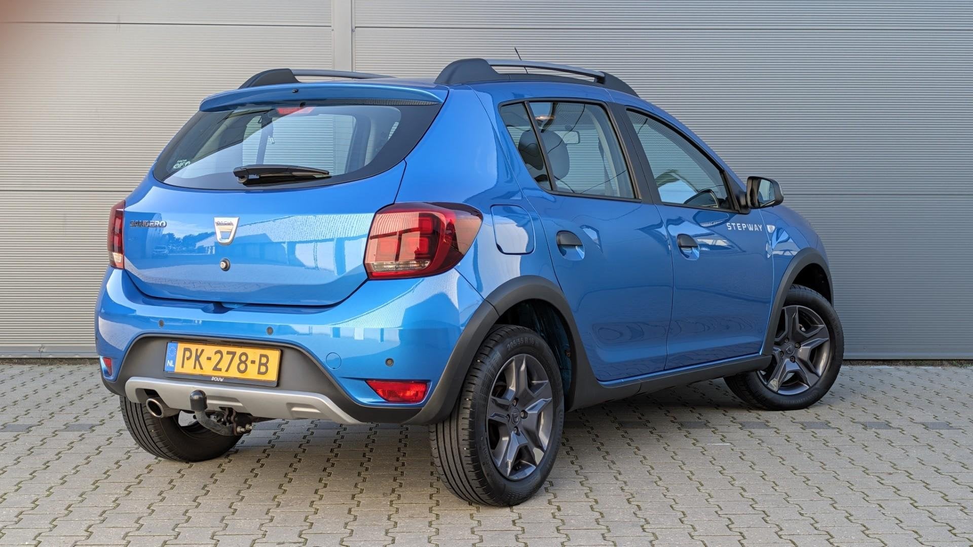 Dacia Sandero 0.9 TCe 90pk SL Stepway | Trekhaak | Navigatie, Auto's, Stof, Euro 6, Verwarmde buitenspiegels, Blauw