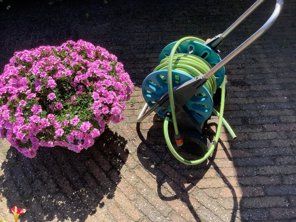 Haspel en tuinslang 15 meter, Tuin en Terras, Ophalen, Gebruikt, Tuinslang