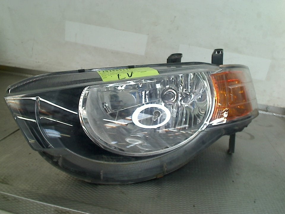 Koplamp Links Mitsubishi Colt (Z2/Z3) 2012 0301249301, Auto-onderdelen, Gebruikt, Info@mitsubishi-motors.de, Mitsubishi, Emil-Frey-Straße 2, Friedberg 61169, , Duitsland