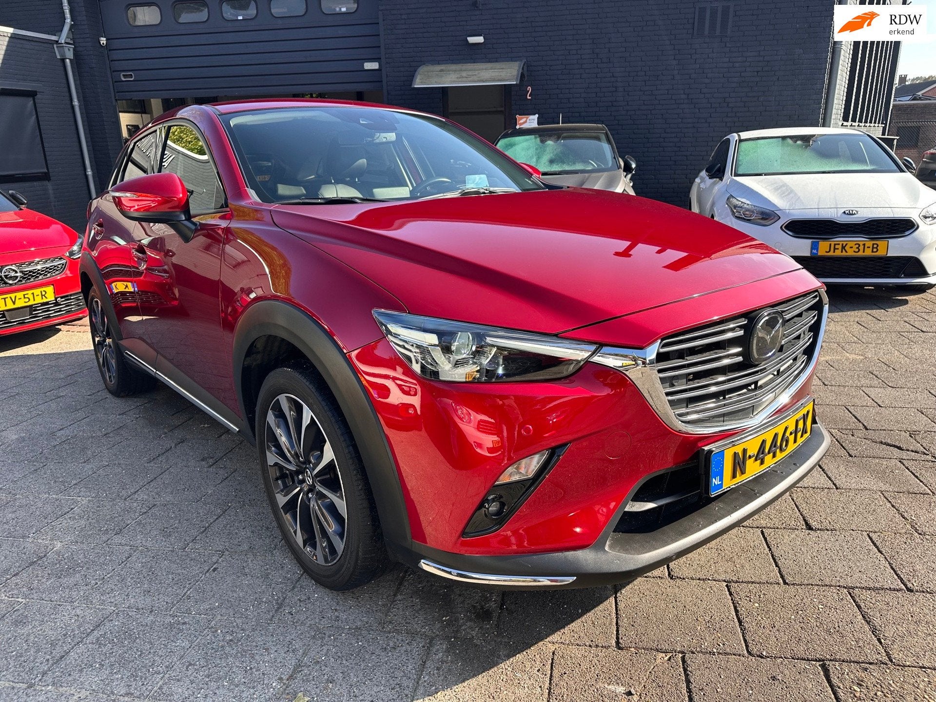 Mazda CX-3 121pk|GT-M Aut|Leder|BOSE|Head-Up|12 Mnd Garantie, Auto's, Gebruikt, 1188 kg, Leder en Stof, SUV of Terreinwagen