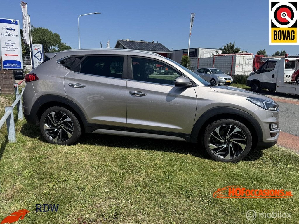 Hyundai Tucson 1.6 T-GDI 4WD Premium AUTOMAAT/CARPLAY/TREKHA, Auto's, Hyundai, Automaat, Stof, Gebruikt, 4 cilinders
