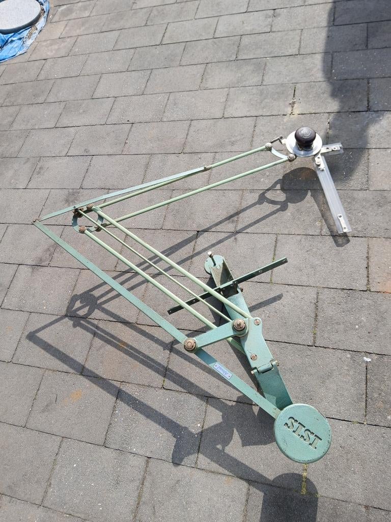 Oude knikarm, Ophalen