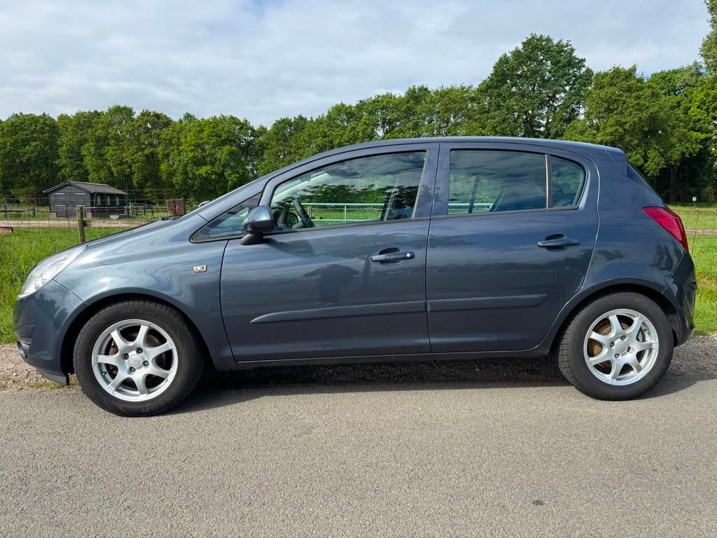 Opel Corsa 1.2-16V Business met airco, Stof, Gebruikt, 4 cilinders, 1229 cc