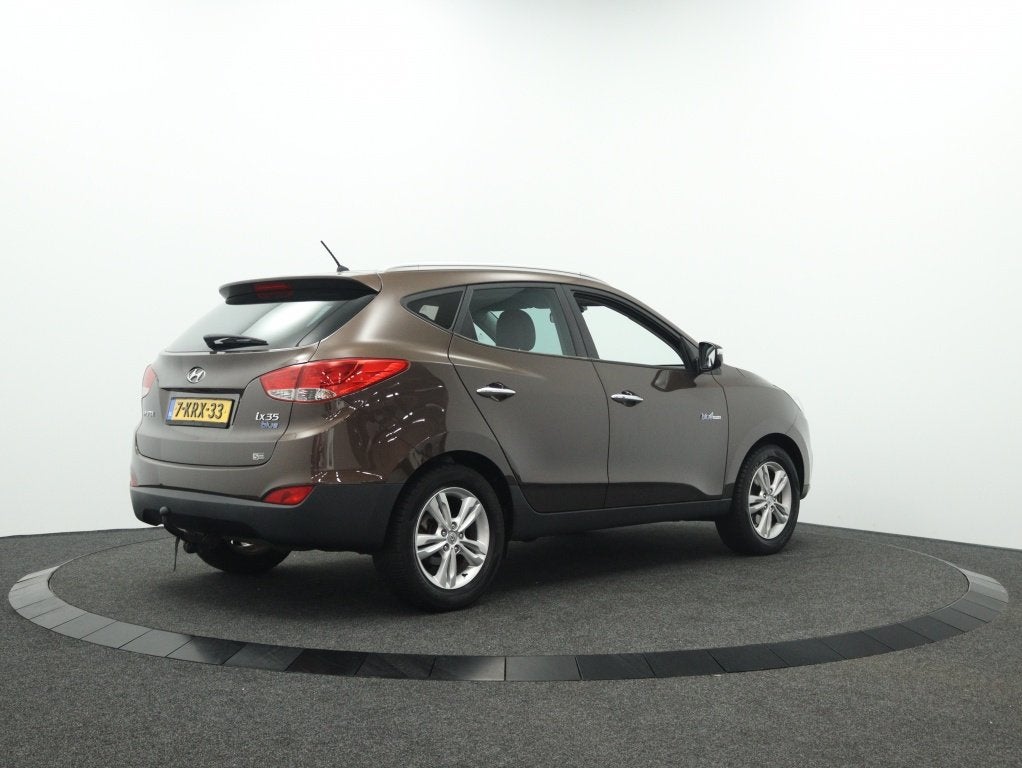 Hyundai ix35 1.6i GDI Style | Trekhaak | Half leder | Cruise, Keurmerk '100% Onderhouden', 135 pk, 4 cilinders, Leder en Stof