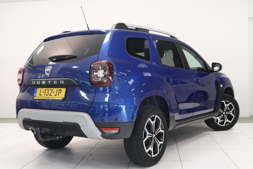 Dacia Duster 1.0 TCe Bi-Fuel Comfort | Airco | Camera | Trek, Auto's, Voorwielaandrijving, Gebruikt, 4 cilinders, Blauw