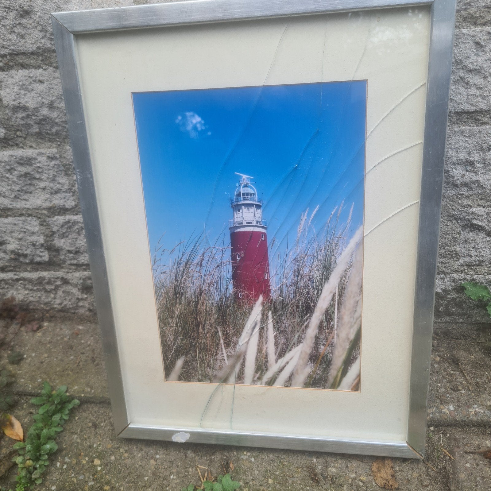 Foto van vuurtoren met gebroken glas, Ophalen, 50 – 75, Gebruikt, Foto of Poster