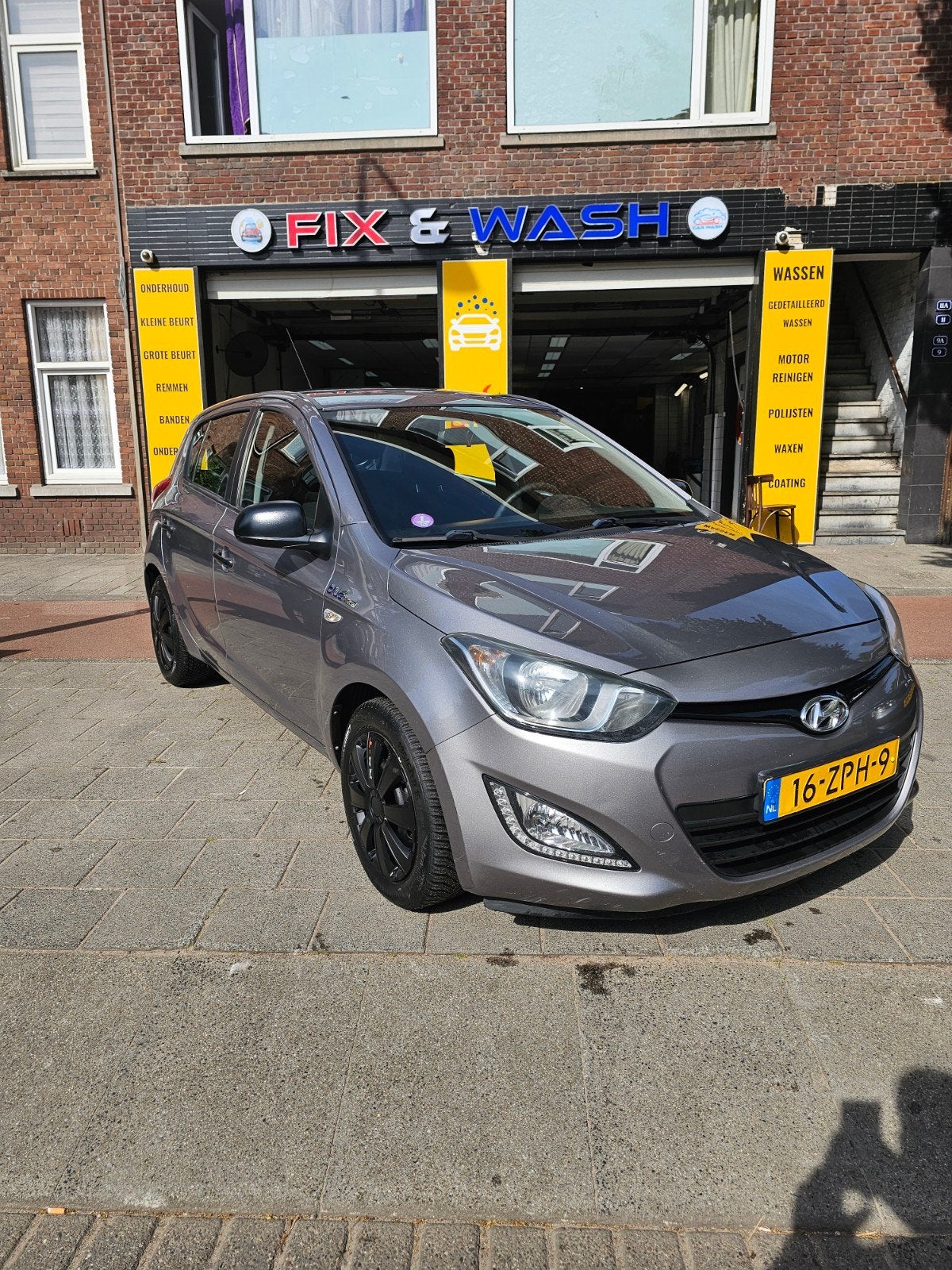 Hyundai i20 1.2I 5-DRS 2013 Grijs, Auto's, Hyundai, 450 kg, 31 €/maand, 4 cilinders, Origineel Nederlands