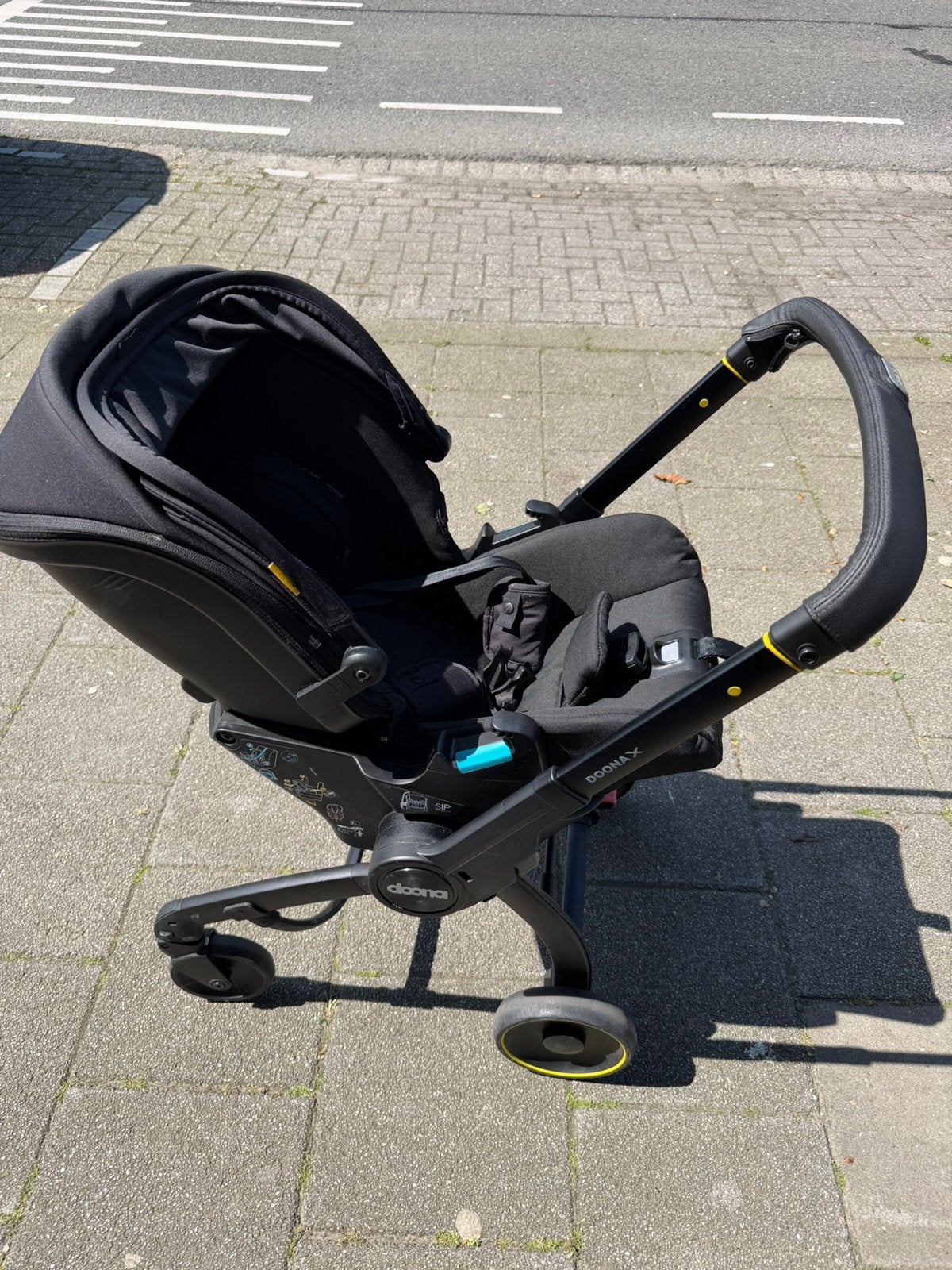 Doona X Autostoel + Kinderwagen + Doona Luiertas Zwart, Overige merken, Autogordel, Ophalen of Verzenden, Zo goed als nieuw