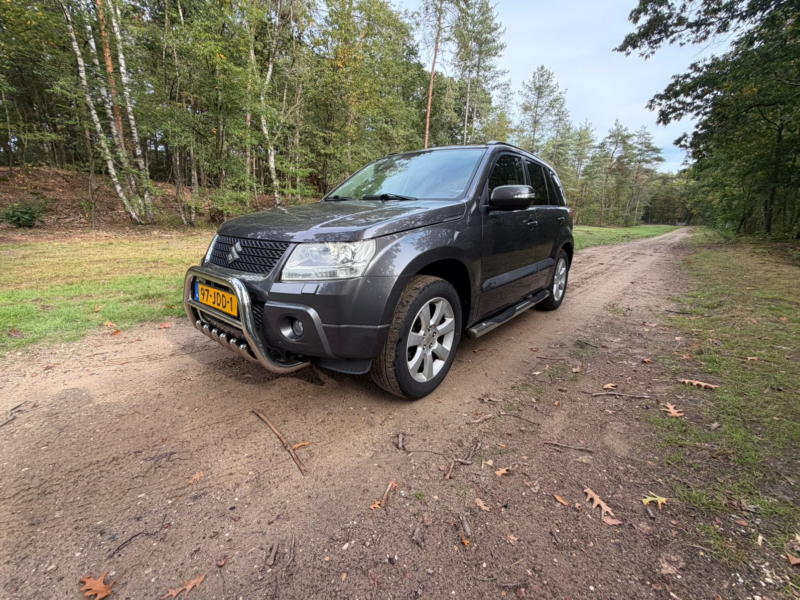Suzuki Grand Vitara 2.4 5D AUT 2009 Grijs stoelverwa trekha, Auto's, Automaat, 4 cilinders, Grand Vitara, Vierwielaandrijving