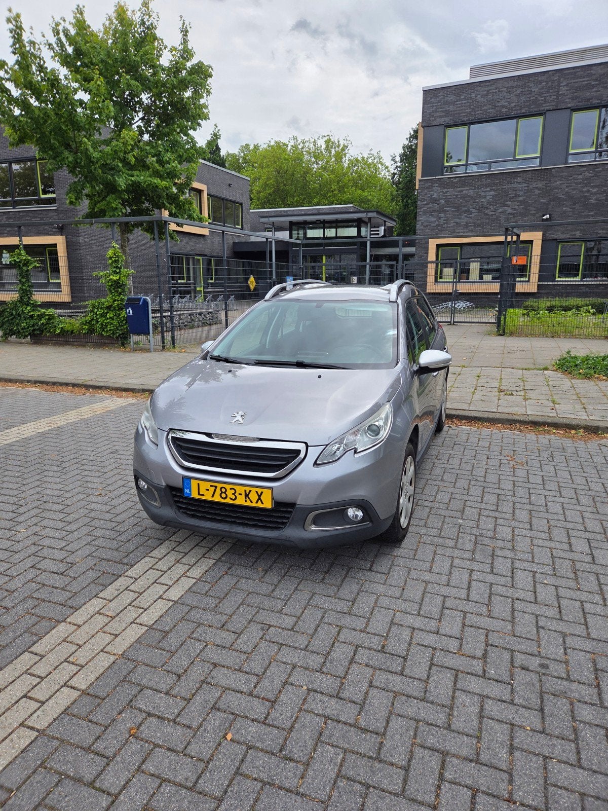 Peugeot 2008 1.2 VTI 60KW/82PK 2015 Grijs, Auto's, Peugeot, Voorwielaandrijving, Euro 5, Handgeschakeld, Particulier