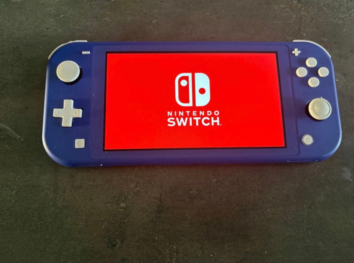 Nintendo Switch Lite Blauw + Originele Oplader, Verzenden, Gebruikt