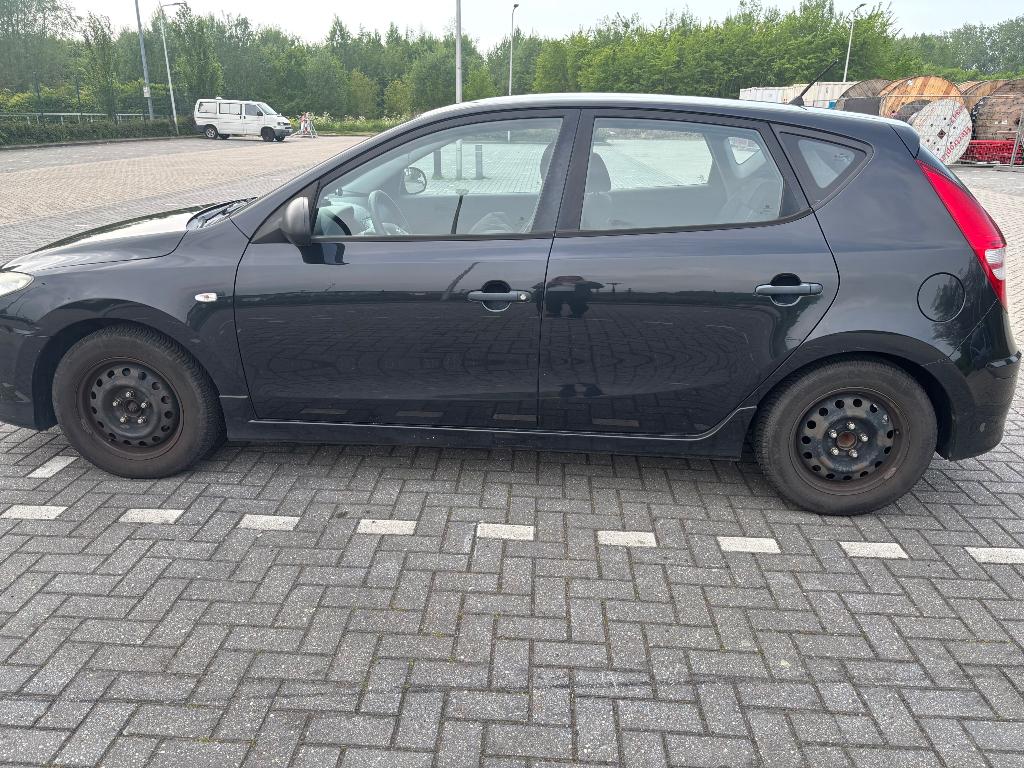Hyundai 2010 Zwart, Auto's, Voorwielaandrijving, Euro 5, 15 km/l, 1396 cc