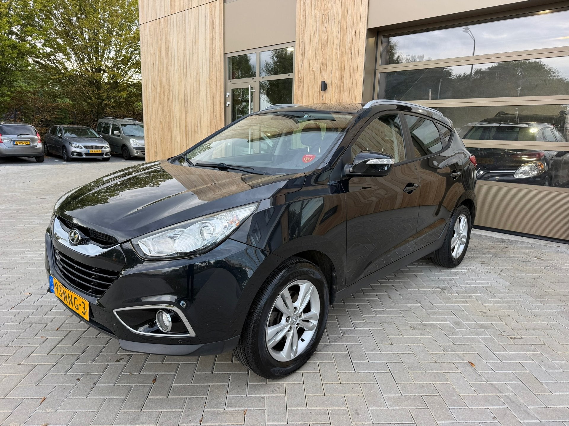 Hyundai Ix35 2.0i Business Edition 5drs| parkeersensoren| Cl, Gebruikt, Zwart, 4 cilinders, Leder en Stof