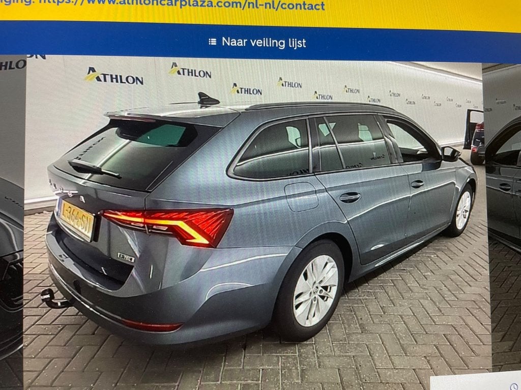 Skoda Octavia Combi 1.0 e-TSI Sport Bns Automaat TREKHAAK /, Auto's, Automaat, Stof, Gebruikt, 23 km/l