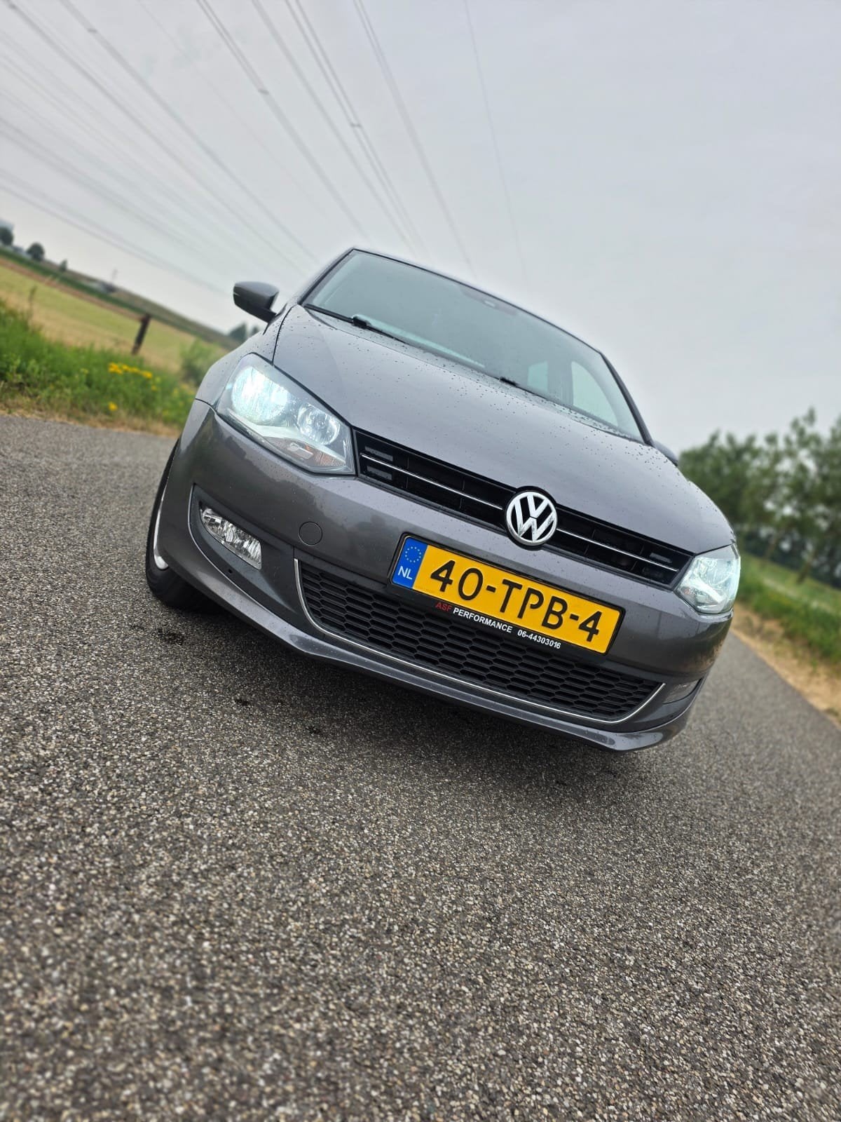 Volkswagen Polo 1.2 TSI bluemotion 66KW 2012 Grijs, Auto's, Voorwielaandrijving, 40 €/maand, 4 cilinders, Origineel Nederlands
