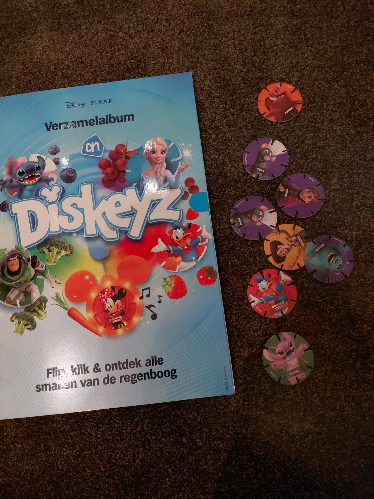 Disney Pixar Diskeyz Verzamelalbum met 8 Diskeyz, Ophalen of Verzenden