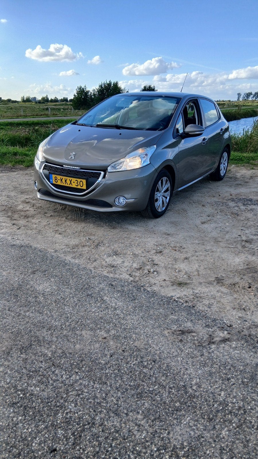 Peugeot 208 1.2 VTI 60KW/82PK 5-D 2013 Grijs, Auto's, Voorwielaandrijving, 31 €/maand, 1199 cc, Origineel Nederlands