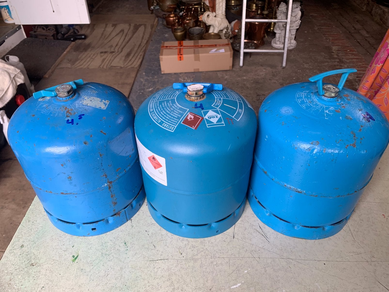 Campinggaz 907 gasflessen, Ophalen