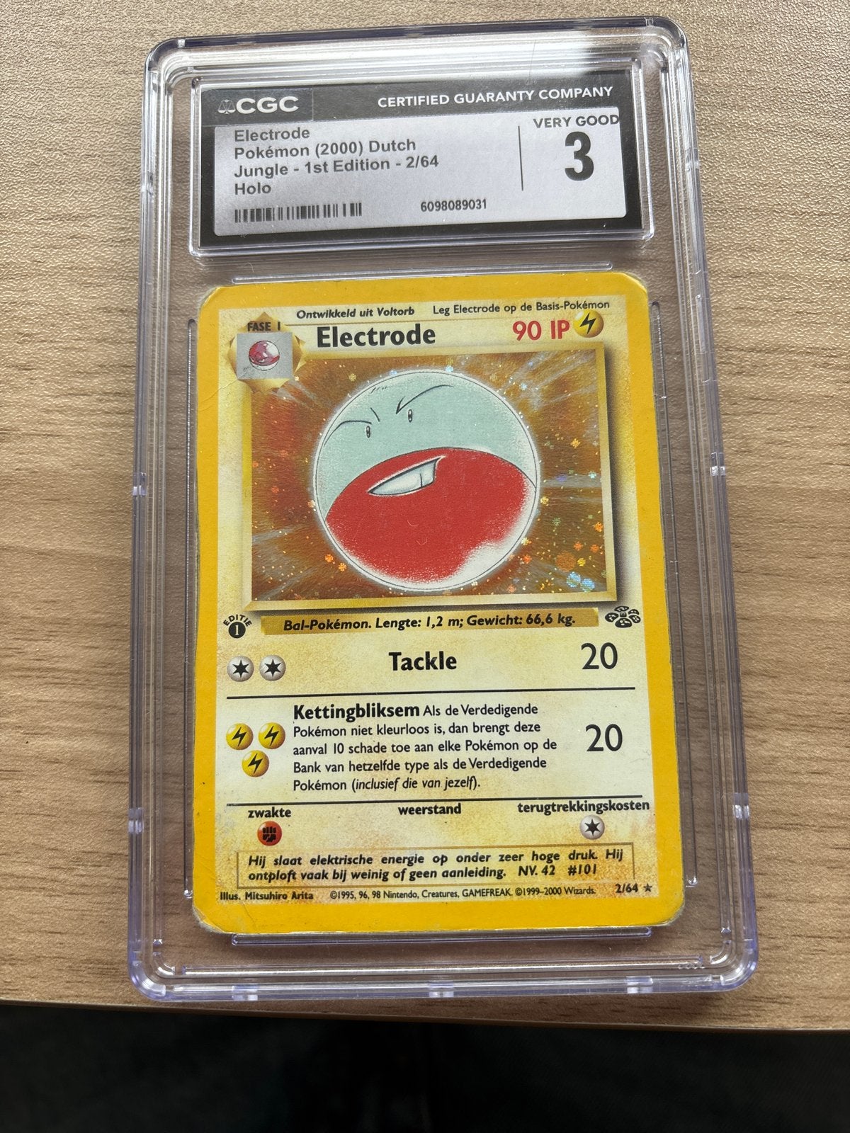 Pokémon Electrode Holo 1st Edition – Jungle – Dutch – CGC 3, Ophalen of Verzenden, Gebruikt, Losse kaart, Foil