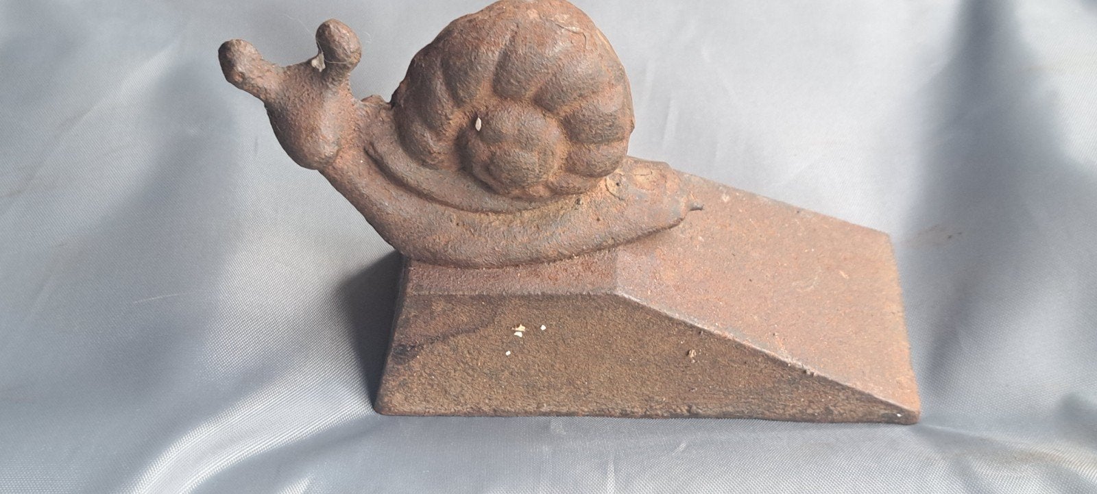 Gietijzeren deurstopper in de vorm van een slak, Antiek en Kunst, Curiosa en Brocante, Ophalen of Verzenden