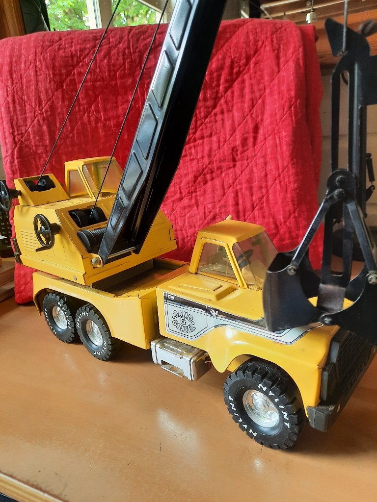 blikken nylint kraanwagen, Ophalen