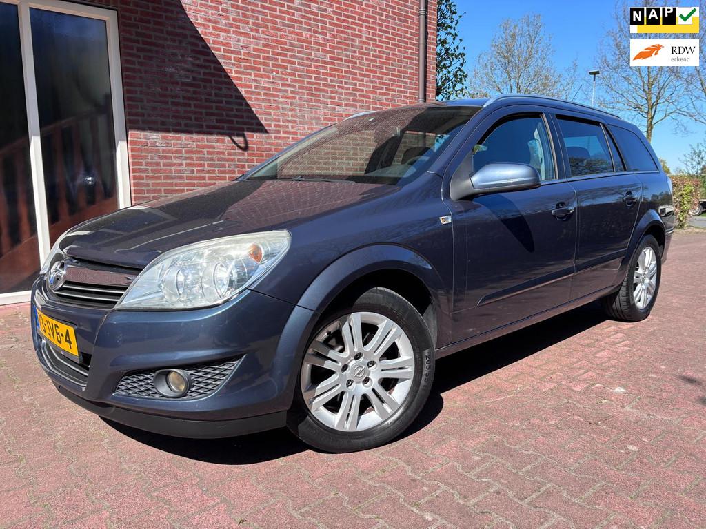 Opel Astra Wagon 1.6 Cosmo, Auto's, Opel, Voorwielaandrijving, 15 km/l, Gebruikt, Zwart