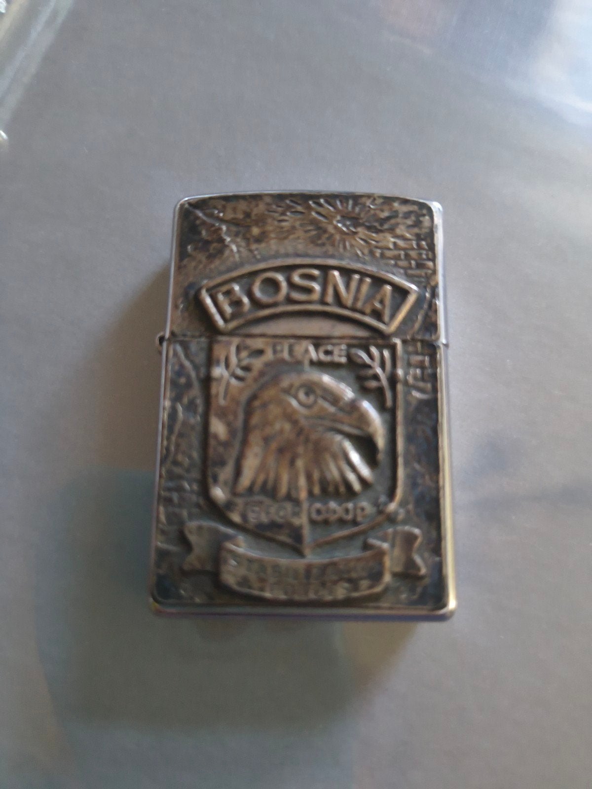Zippo aansteker Bosnia sfor - Uniek verzamelobject, Ophalen of Verzenden, Gebruikt, Aansteker