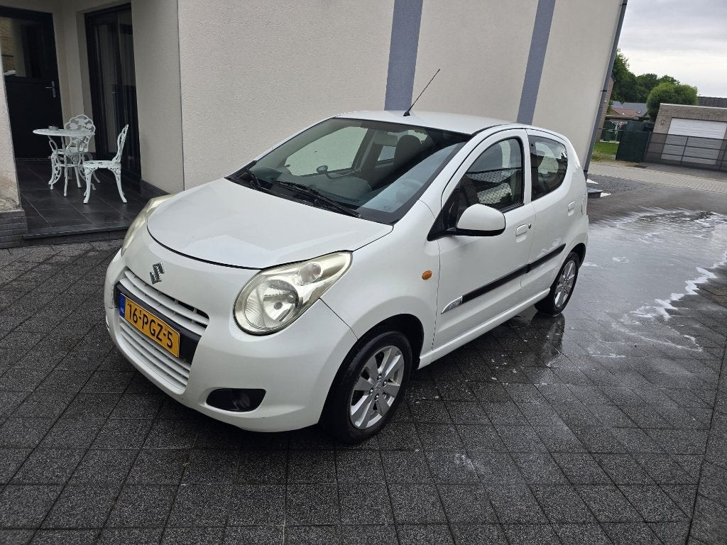 Suzuki Alto 1.0 2011 Wit, Auto's, Voorwielaandrijving, Stof, 200 kg, 4 stoelen