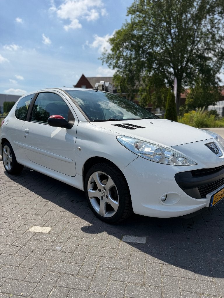 Peugeot 206+ 1.4 3D 2012 Wit, Auto's, Voorwielaandrijving, Stof, 4 cilinders, Wit