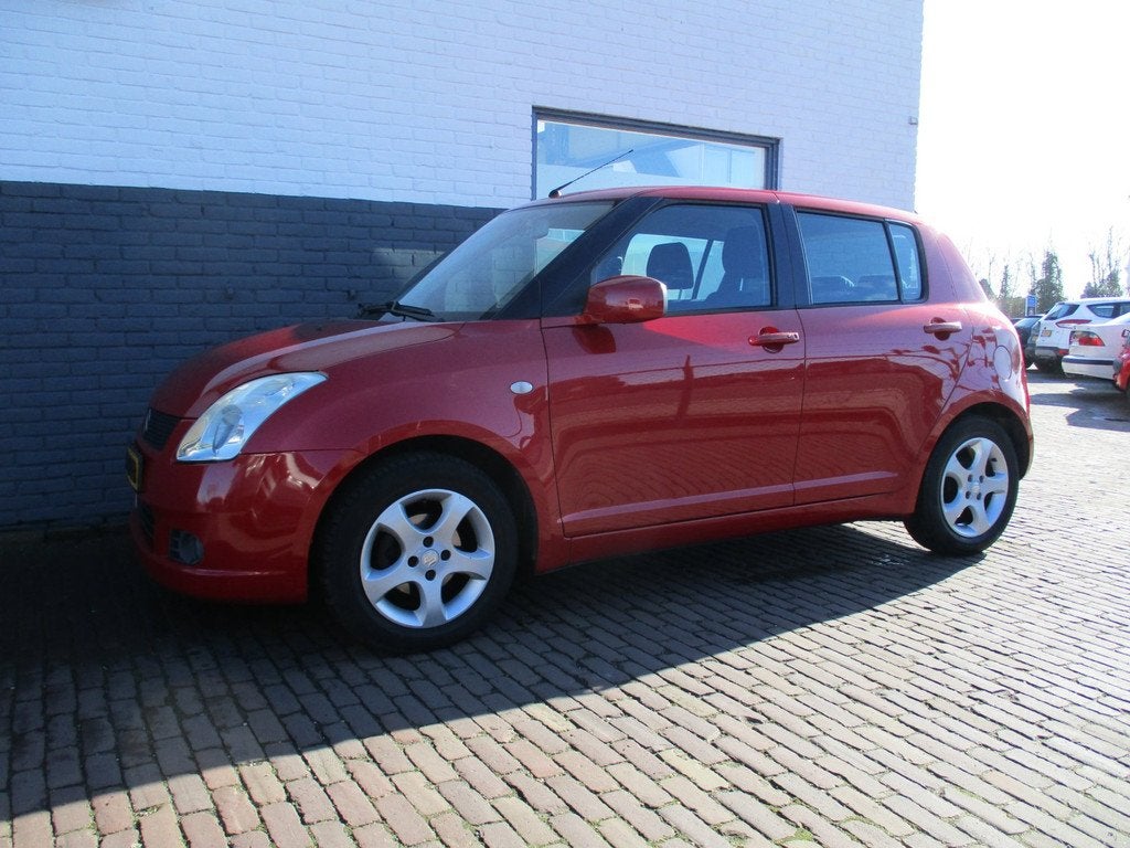 Suzuki Swift 1.3 Exclusive, Auto's, Suzuki, Voorwielaandrijving, Stof, Zwart, 965 kg