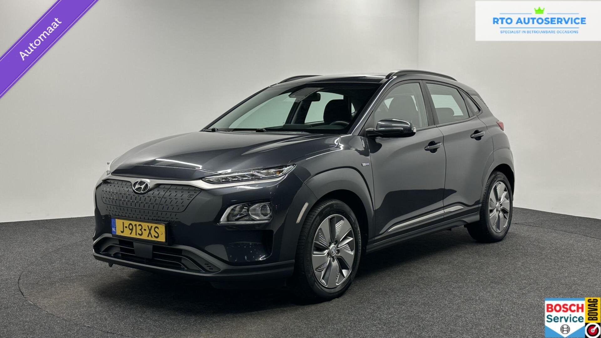 Hyundai Kona EV Comfort 64 kWh 3 Fase Warmtepomp CAMERA CARP, Auto's, Stof, Gebruikt, Met garantie (alle), Origineel Nederlands