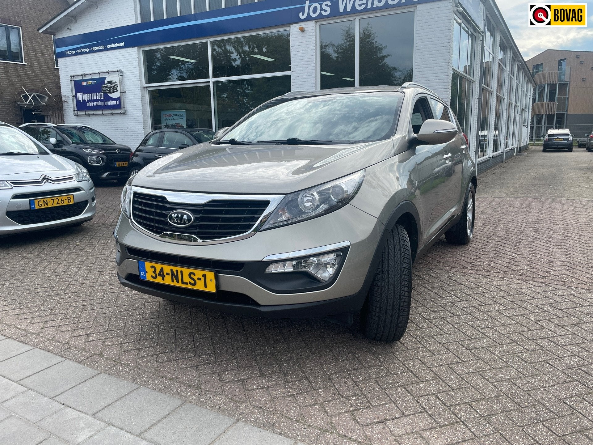 Kia Sportage 2.0 X-ecutive Plus Pack, Auto's, Gebruikt, Zwart, 163 pk, Handgeschakeld