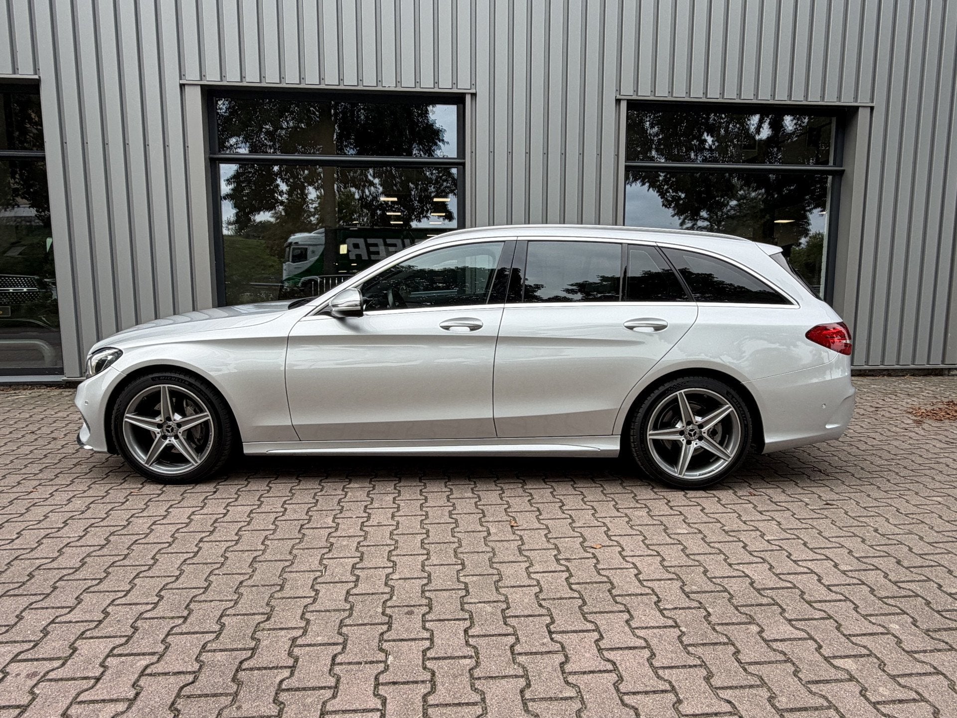 Mercedes-Benz C-Klasse Estate 180 AMG Trekhaak, Led-koplampe, Auto's, Automaat, 12 maanden, Achterwielaandrijving, Automatische klimaatregeling