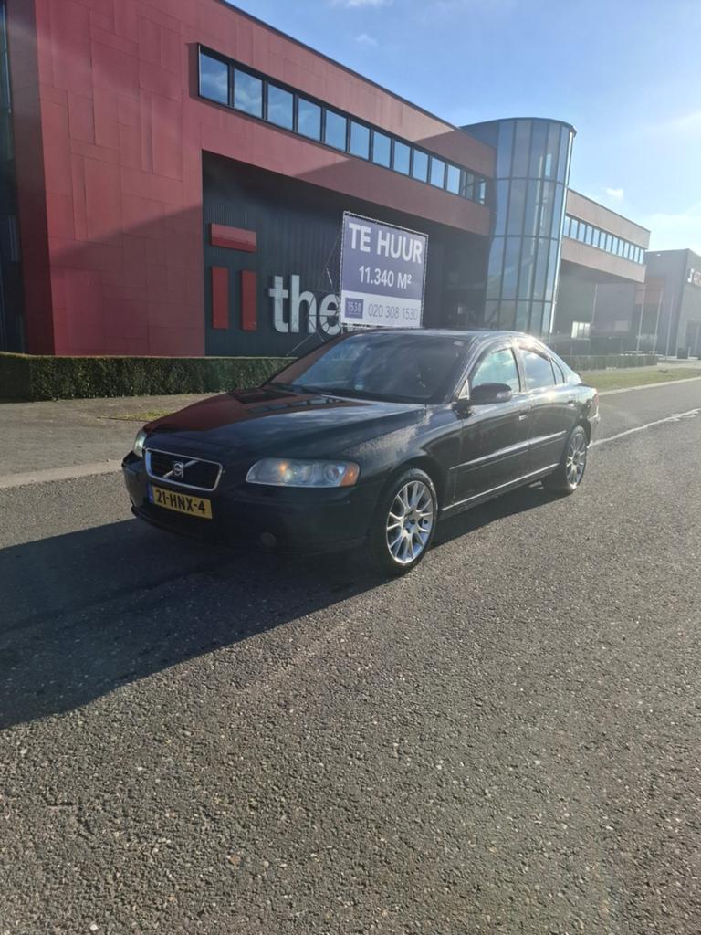 Volvo S60 2.4 140PK 2009 Zwart, Auto's, Voorwielaandrijving, Beige, Overige kleuren, Lichtsensor