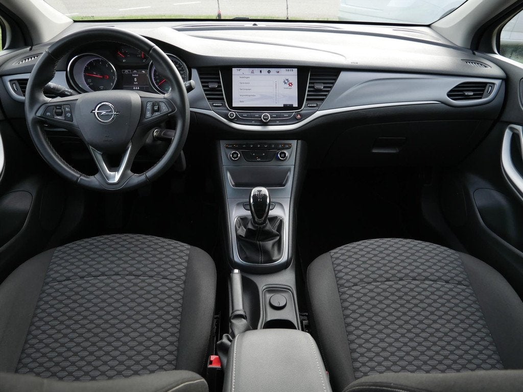 OPEL Astra ST 1.0 Turbo 105pk Online Edition Plus | Carpay |, 12 maanden, Stof, Gebruikt, 1178 kg