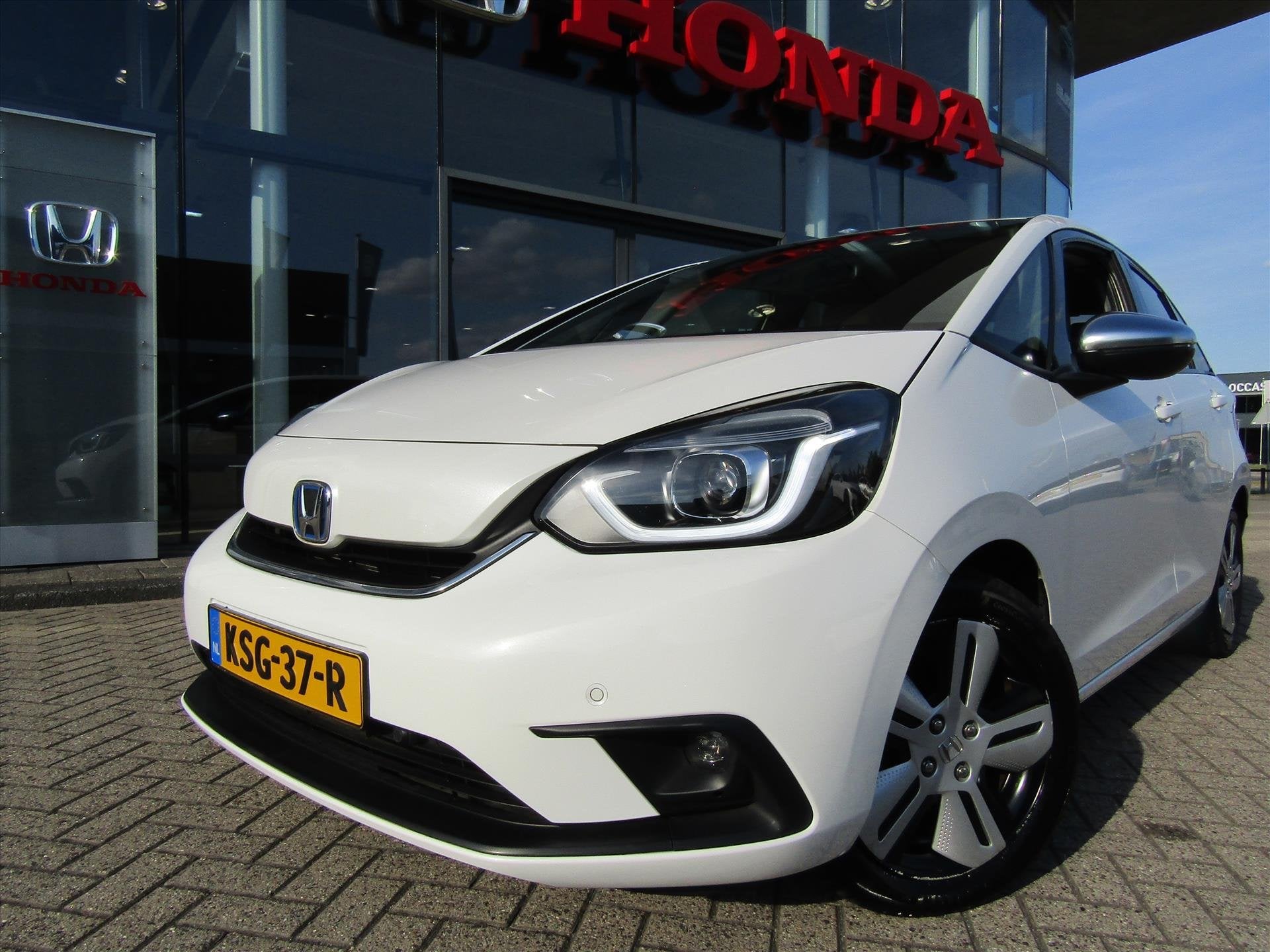 Honda Jazz 1.5 i-MMD 109pk Hybrid CVT Executive, ALLWEATHERB, Auto's, Honda, Dealer onderhouden, Leder en Stof, Wit, 98 pk