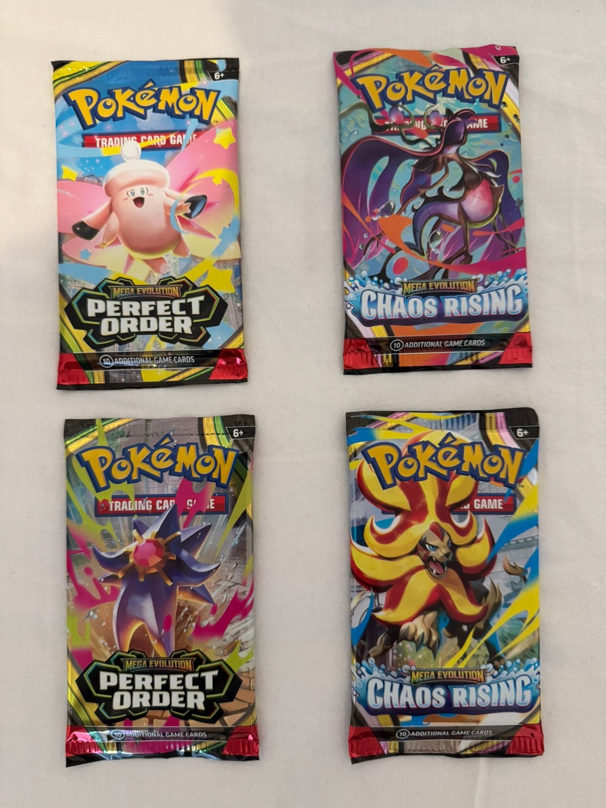 Pokémon Mega Evolution Perfect Order Booster Chaos Rising, Ophalen of Verzenden, Nieuw, Booster, Foil