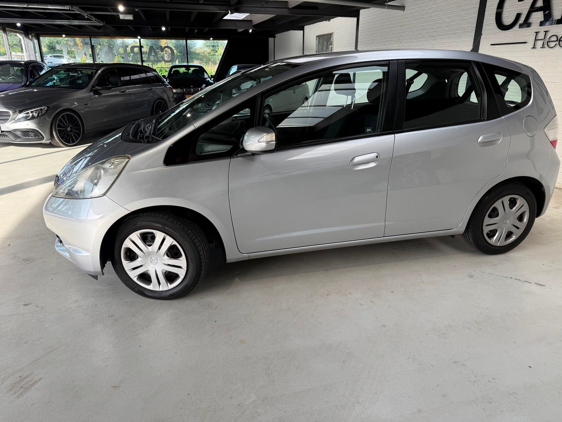 Honda Jazz 1.4 Comfort 2009 Clima Trekhaak Deal O.H Zuinige, Auto's, Voorwielaandrijving, 1046 kg, 450 kg, Gebruikt